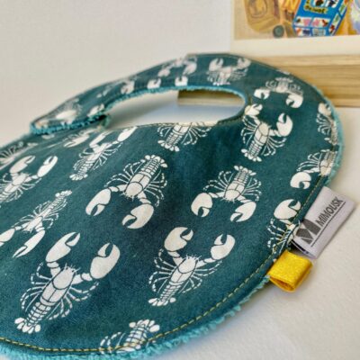 Bavoir motif homard, bleu canard, dos éponge bleue