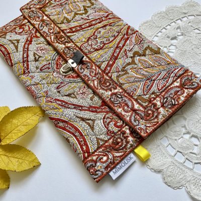 Pochette matelassée rouille & jaune / attache-cartable