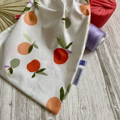 Sac à maillot mouillé/ enduit motif pêches marisol / blanc vert orange parme – Image 2