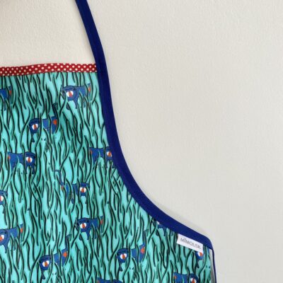 Tablier enduit motif babouin vert